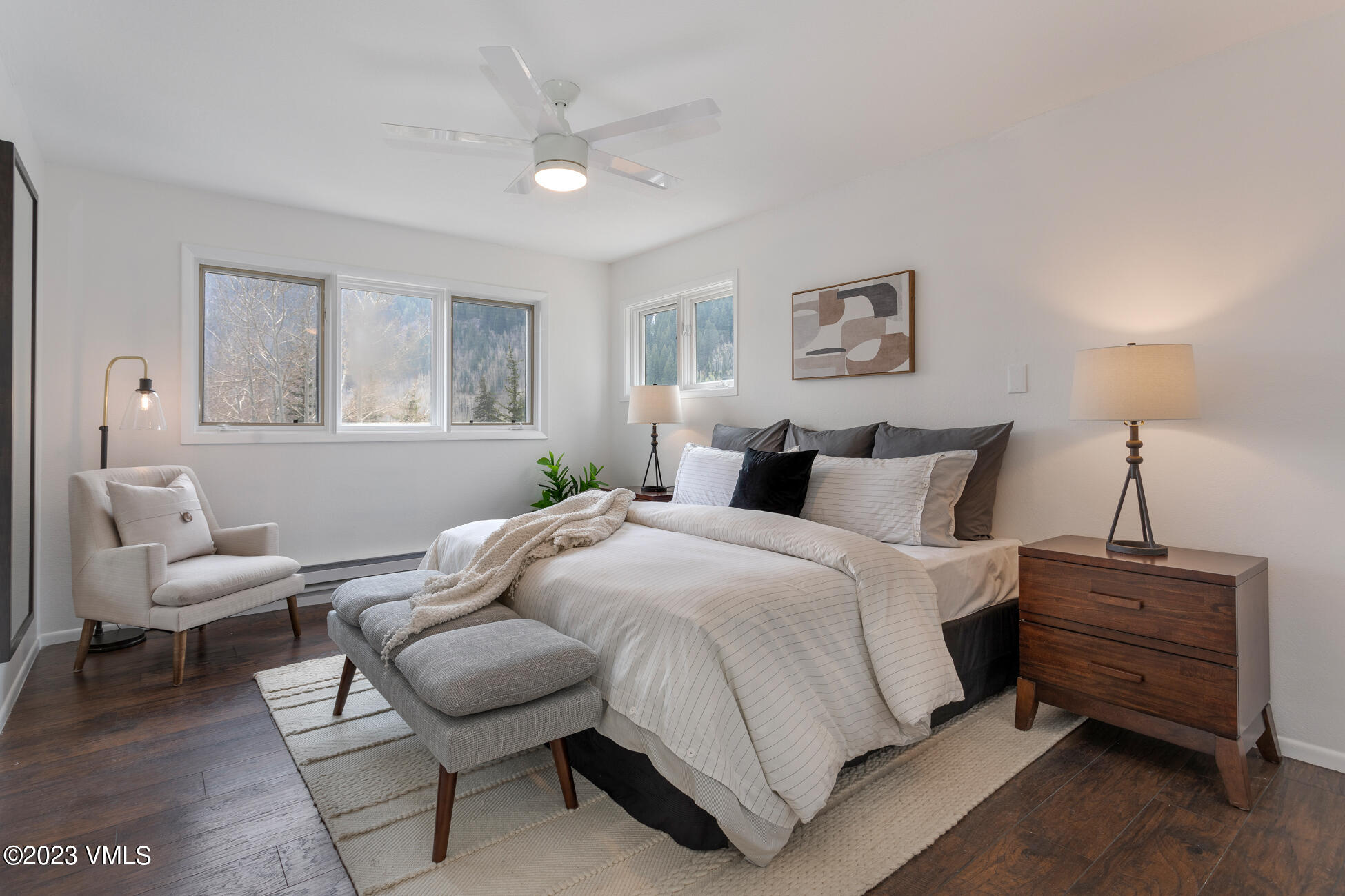 3910 Fall Line Drive, Unit 19 Vail, CO 81657 - Photo 15 of 40 a bedroom with a bed a couch and window