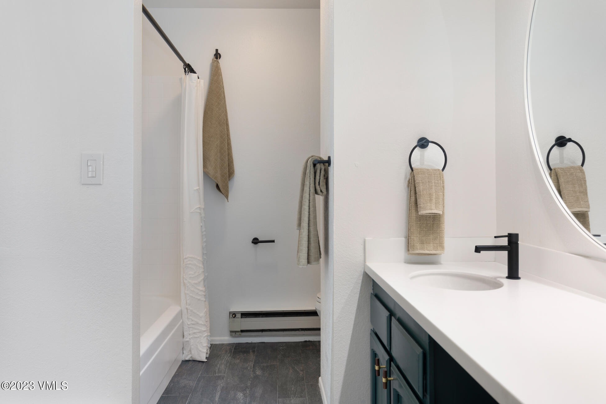 3910 Fall Line Drive, Unit 19 Vail, CO 81657 - Photo 19 of 40 a bathroom with a sink and a mirror