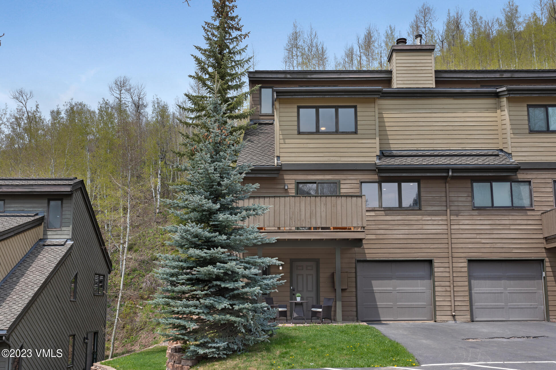 3910 Fall Line Drive, Unit 19 Vail, CO 81657 - Photo 2 of 40 a front view of a house with garden