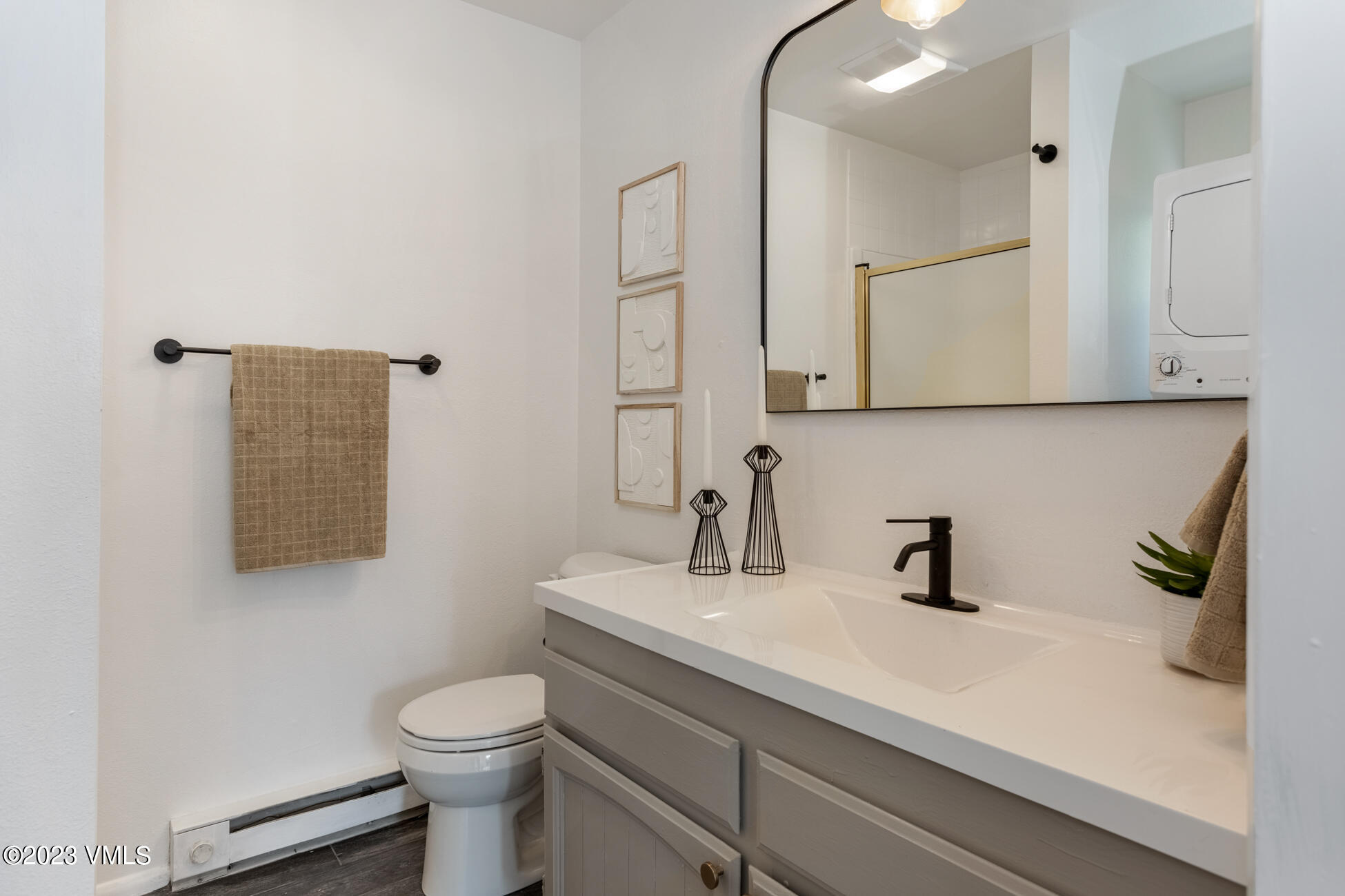 3910 Fall Line Drive, Unit 19 Vail, CO 81657 - Photo 25 of 40 a bathroom with a sink a toilet and mirror