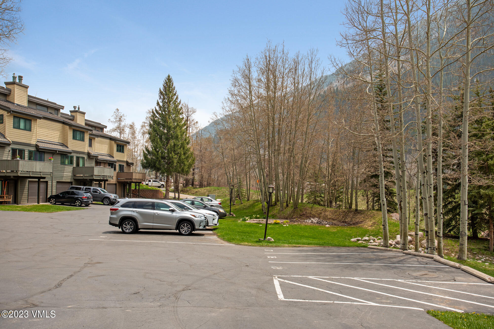 3910 Fall Line Drive, Unit 19 Vail, CO 81657 - Photo 40 of 40 a front view of a building with garden