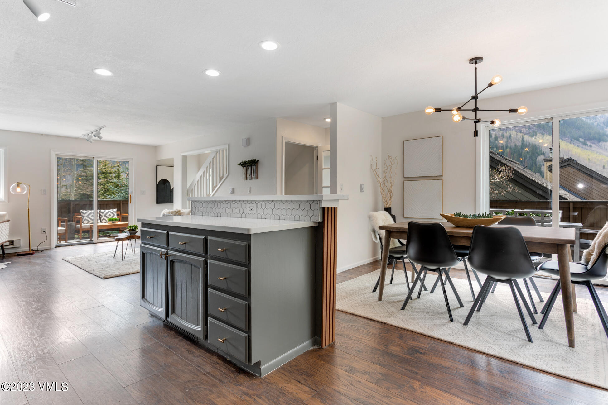 3910 Fall Line Drive, Unit 19 Vail, CO 81657 - Photo 6 of 40 a kitchen with a table and chairs in it