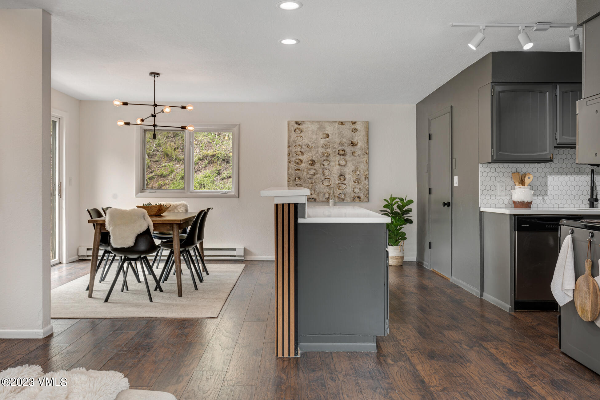 3910 Fall Line Drive, Unit 19 Vail, CO 81657 - Photo 7 of 40 a view of a dining room with furniture and chandelier