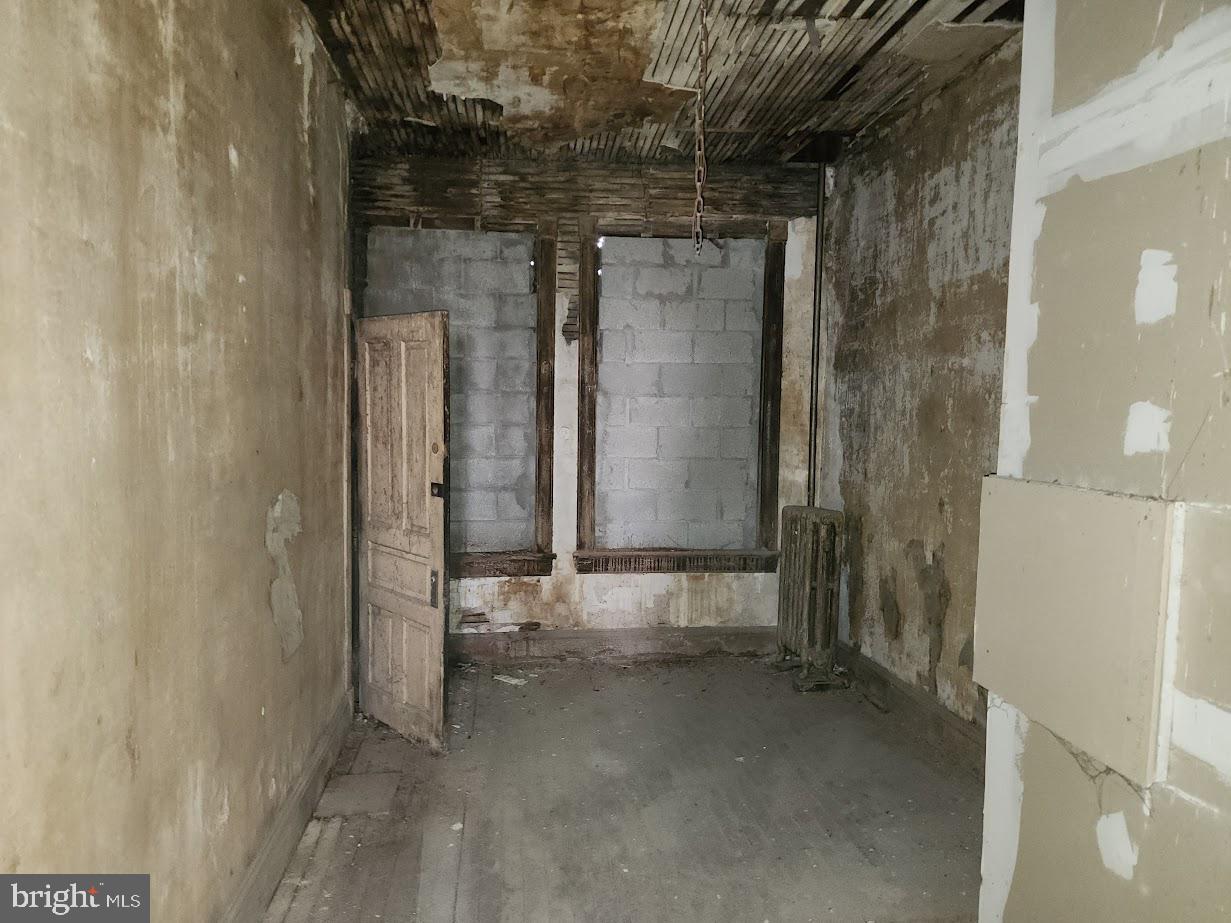 9 East State Street Trenton, NJ 08608 - Photo 23 of 29 a view of a bathroom with a shower