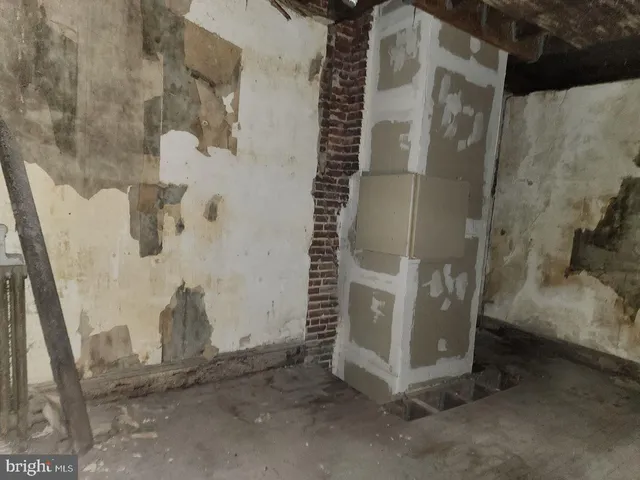 a view of a building with sitting area