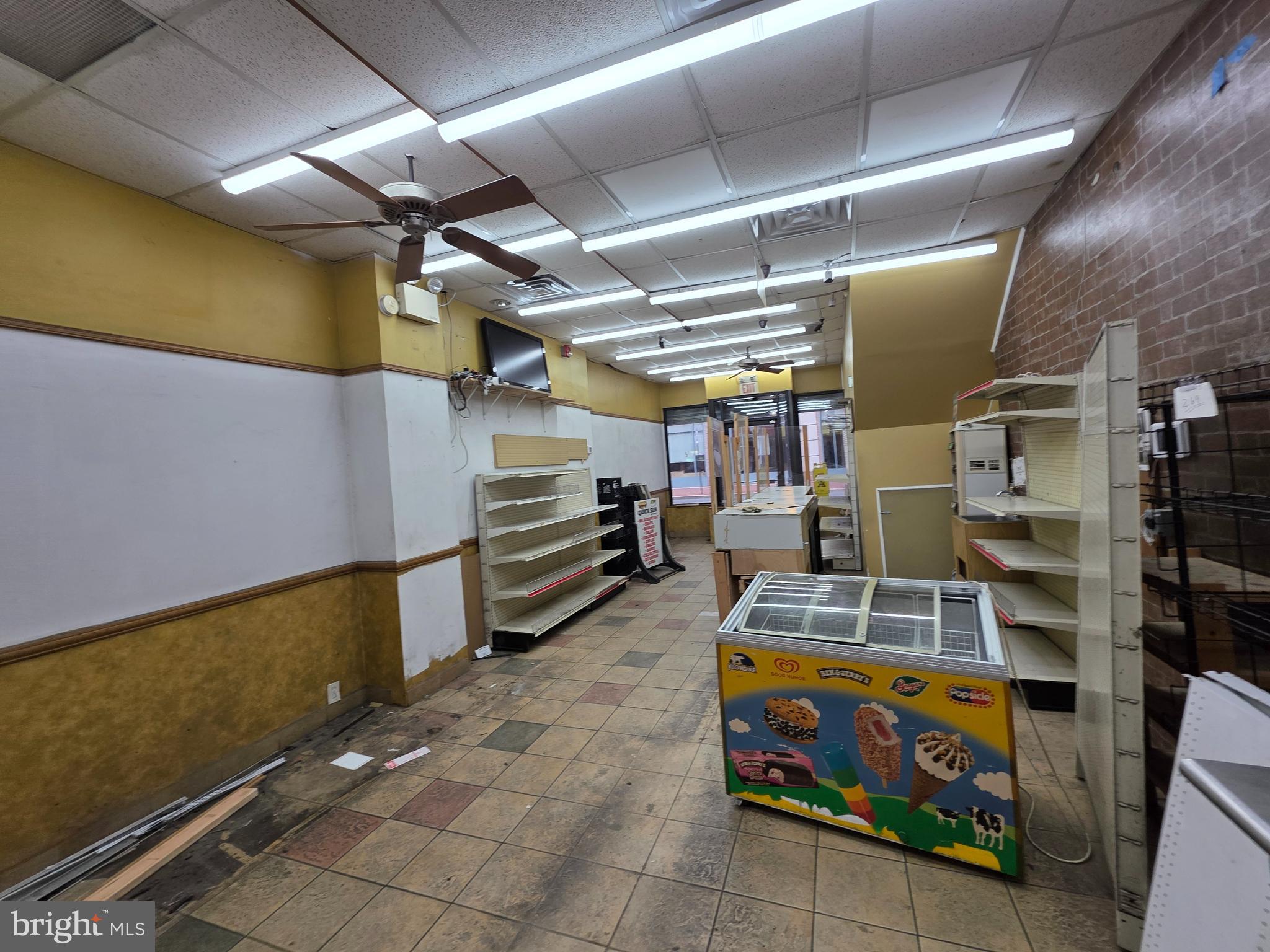 9 East State Street Trenton, NJ 08608 - Photo 5 of 29 a storage room with washer and dryer