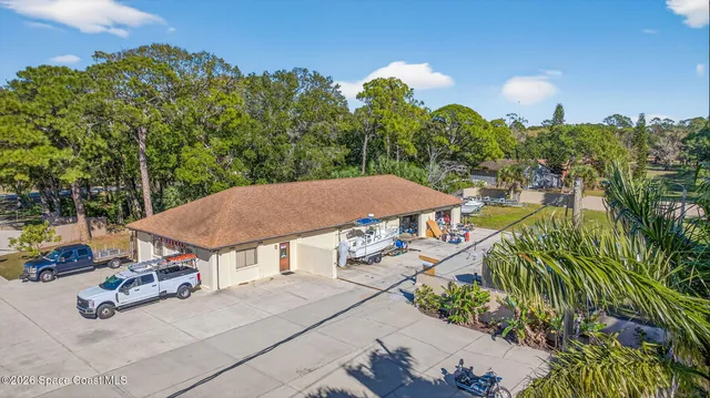 a view of a garden with an outdoor space