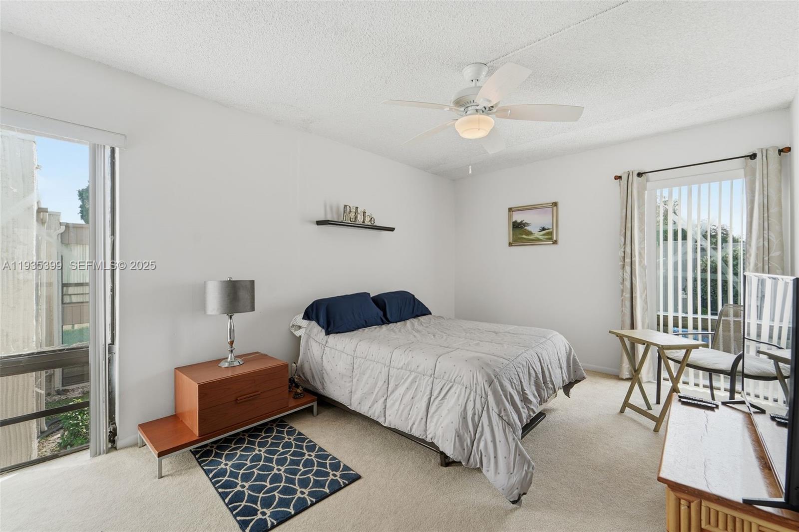 6561 Spring Bottom Way, Unit 234 Boca Raton, FL 33433 - Photo 17 of 31 a bedroom with a bed furniture and a window