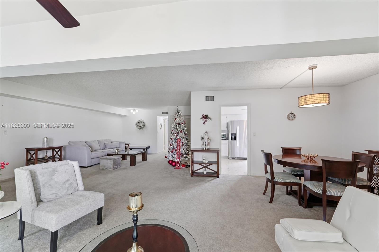 6561 Spring Bottom Way, Unit 234 Boca Raton, FL 33433 - Photo 2 of 31 a living room with furniture and wooden floor