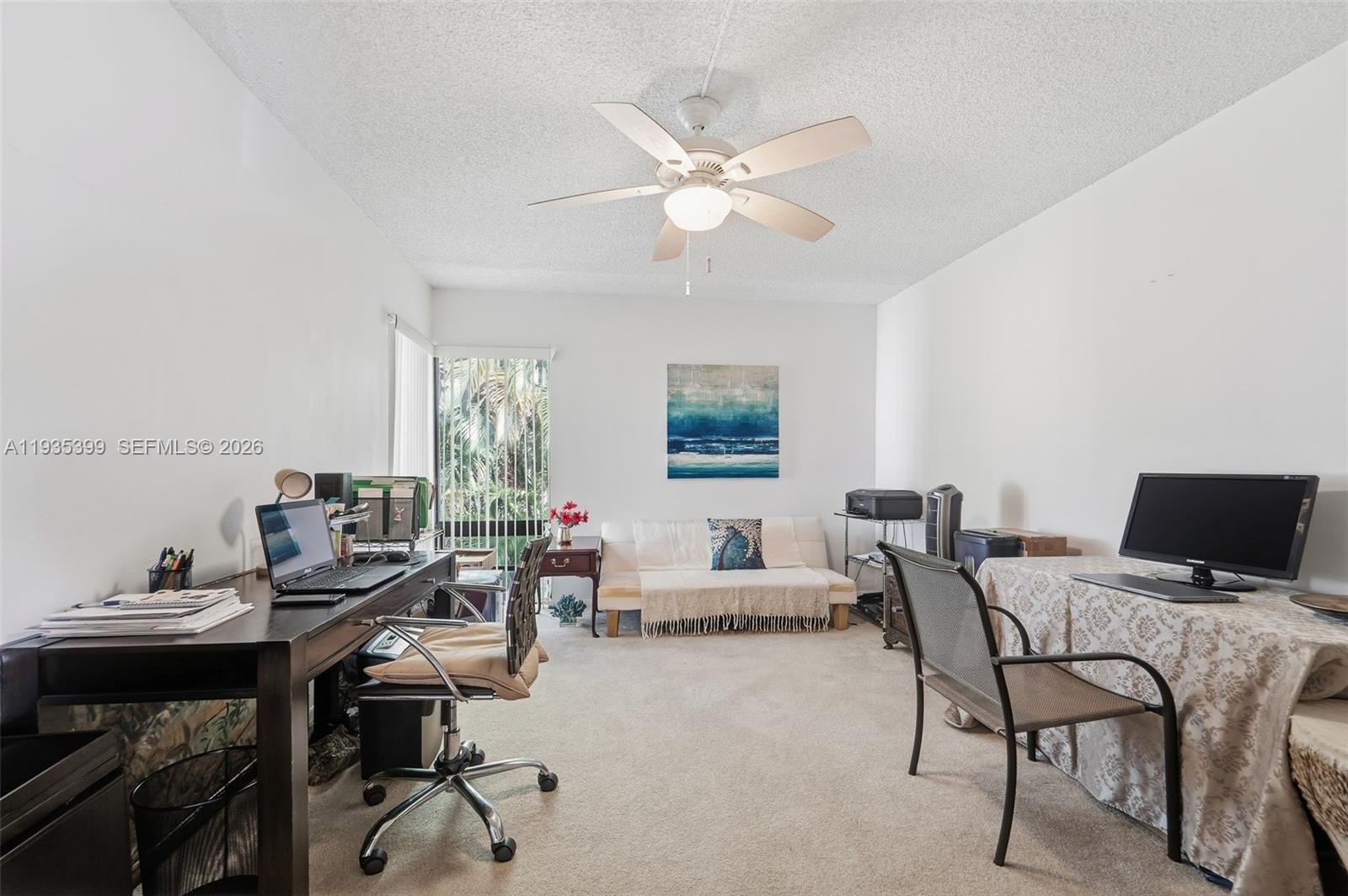 6561 Spring Bottom Way, Unit 234 Boca Raton, FL 33433 - Photo 25 of 33 a view of a workspace with furniture and a window