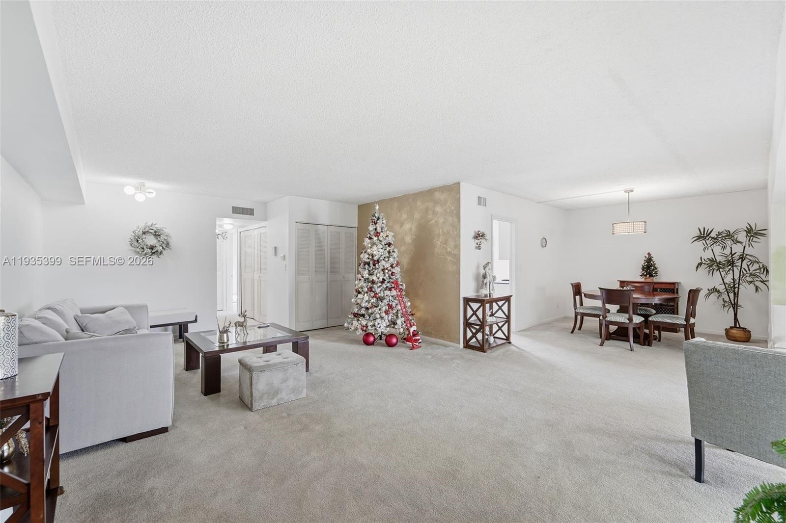 6561 Spring Bottom Way, Unit 234 Boca Raton, FL 33433 - Photo 6 of 33 a view of livingroom with furniture and white walls