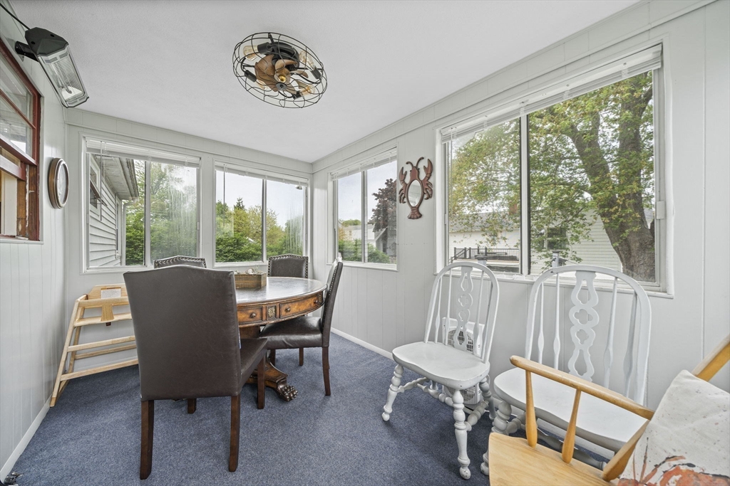 15 D Street Hull, MA 02045 - Photo 14 of 42 a view of a dining room with furniture window and outside view