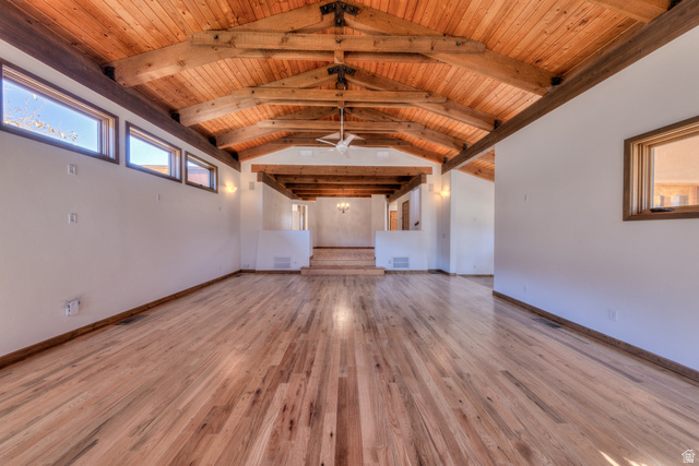 423 Amber Lane Moab, UT 84532 - Photo 14 of 63 living room, wood ceiling with exposed beams and oak wood flooring