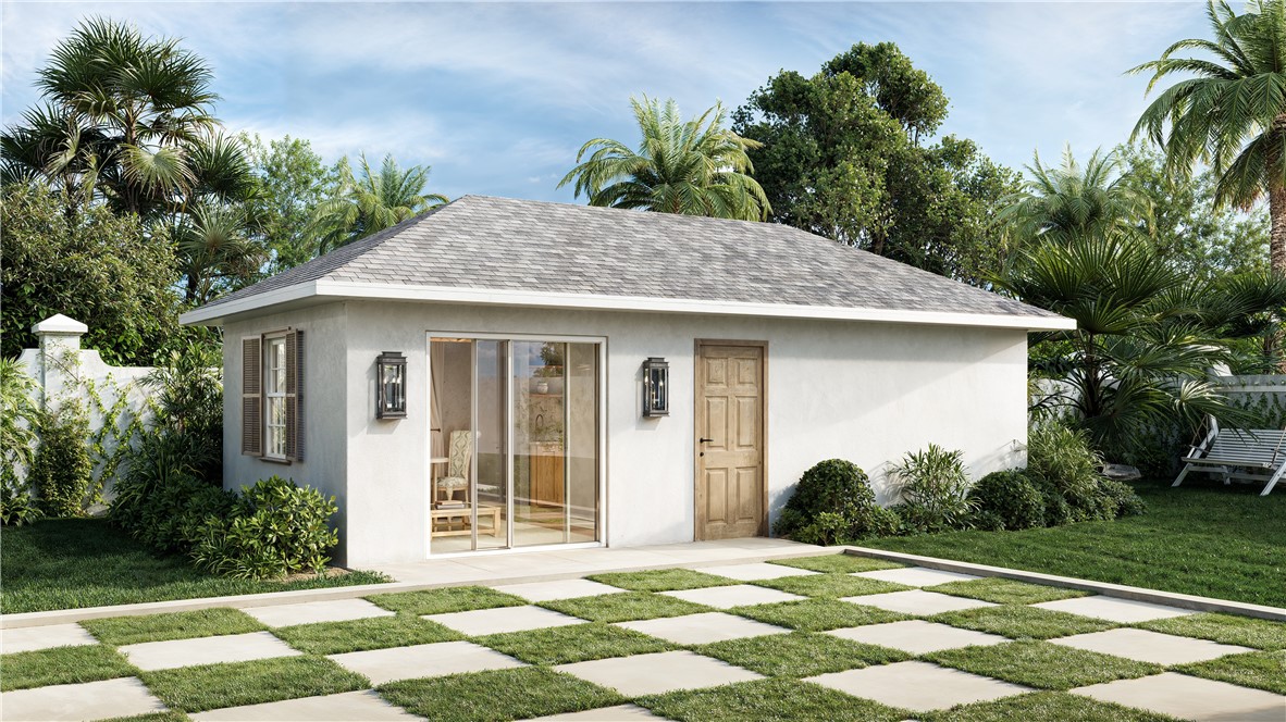 545 Date Palm Road Vero Beach, FL 32963 - Photo 12 of 13 a house with a yard