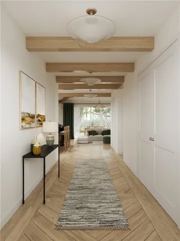 a living room with furniture a window and a table