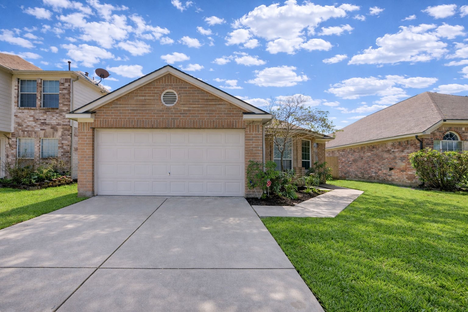 19427 Harvest Stream Way Houston, TX 77084 - Photo 1 of 38 a front view of house with yard and green space