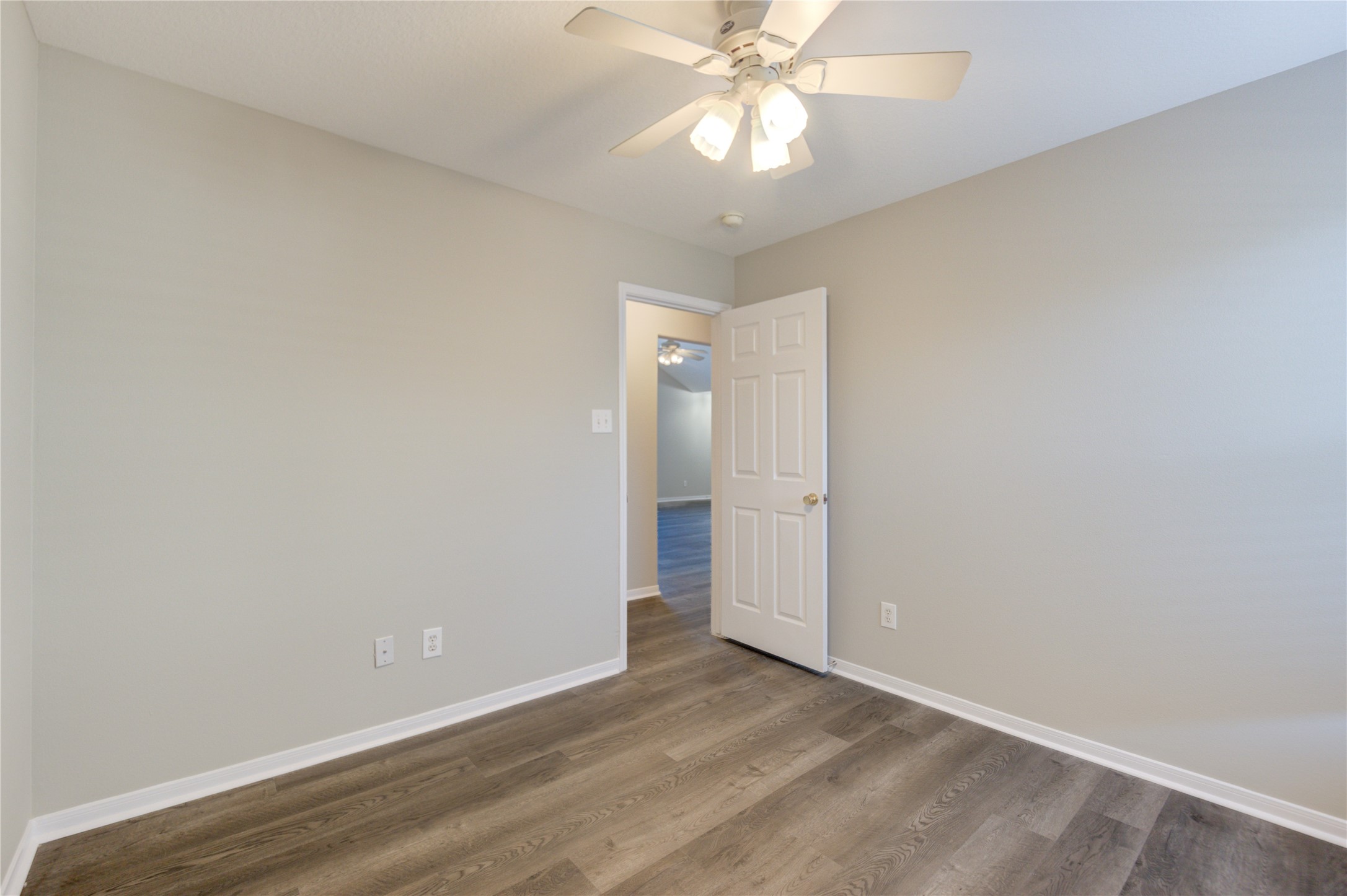 19427 Harvest Stream Way Houston, TX 77084 - Photo 24 of 38 wooden floor in an empty room