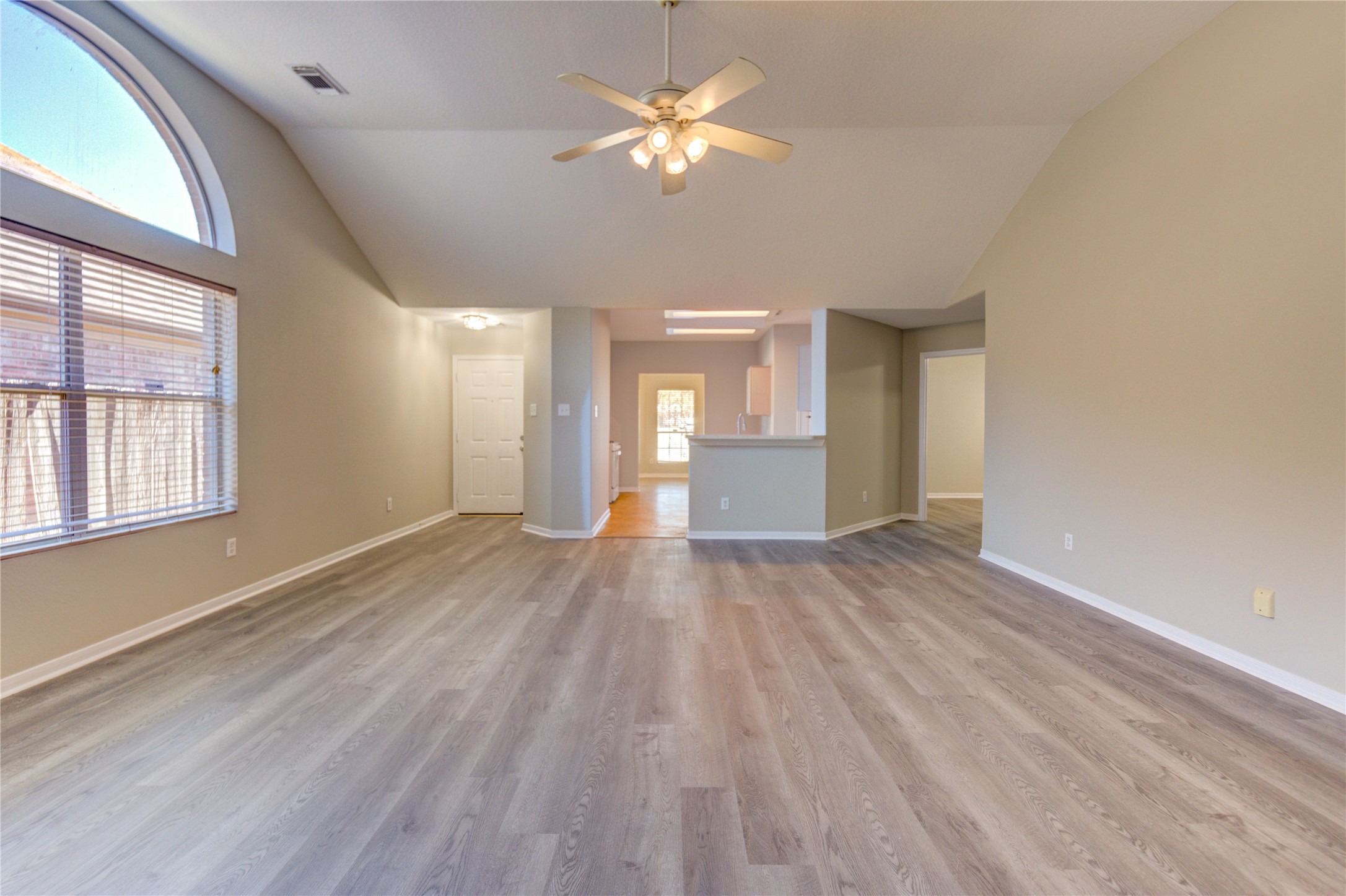 19427 Harvest Stream Way Houston, TX 77084 - Photo 6 of 38 a view of empty room with wooden floor and fan
