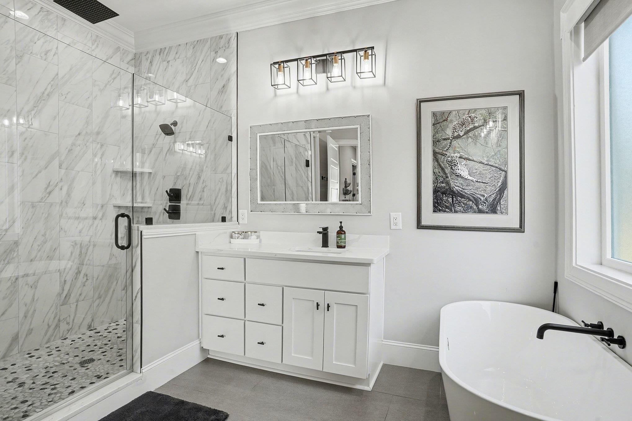 902 Shipmaster Avenue Myrtle Beach, SC 29579 - Photo 18 of 40 Full bathroom with a freestanding bath, a marble finish shower, vanity, and crown molding