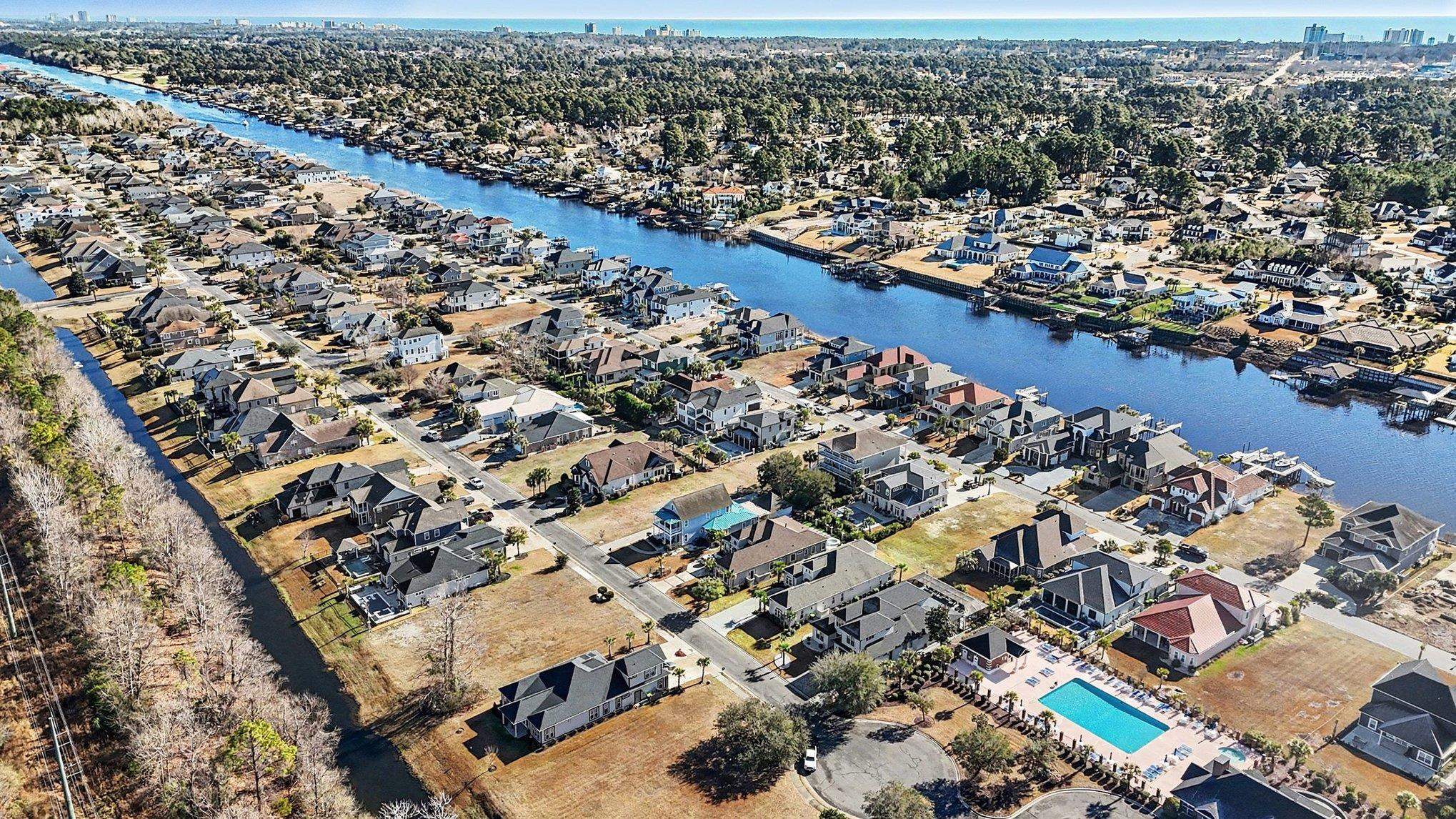 902 Shipmaster Avenue Myrtle Beach, SC 29579 - Photo 38 of 40 Aerial overview of property's location featuring nearby suburban area and a large body of water