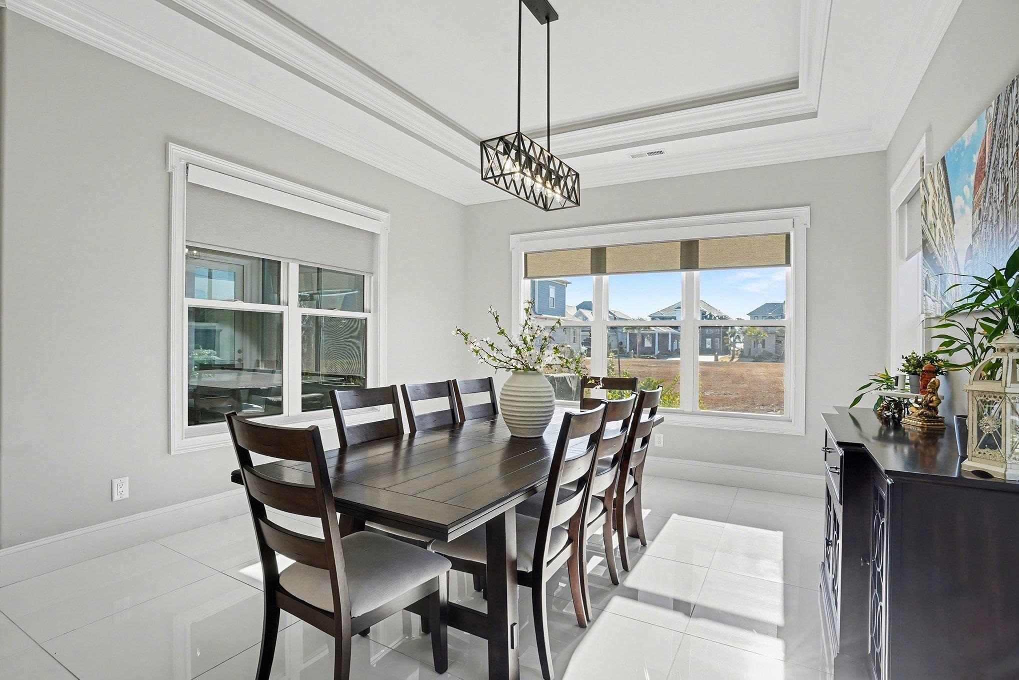 902 Shipmaster Avenue Myrtle Beach, SC 29579 - Photo 8 of 40 Dining room featuring crown molding and light tile patterned flooring