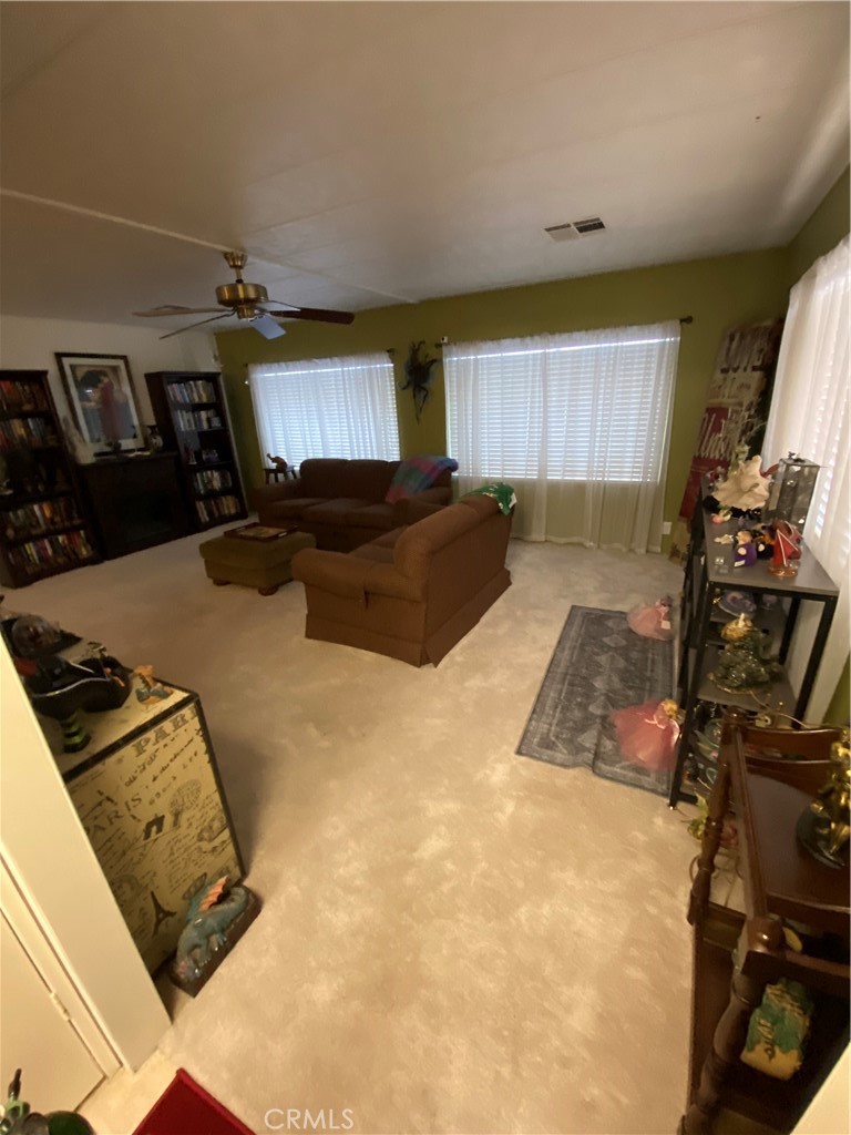 12680 4th Street, Unit 39 Yucaipa, CA 92399 - Photo 11 of 45 a bedroom with furniture and a window