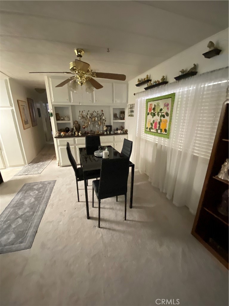 12680 4th Street, Unit 39 Yucaipa, CA 92399 - Photo 18 of 45 a view of a dining room with furniture