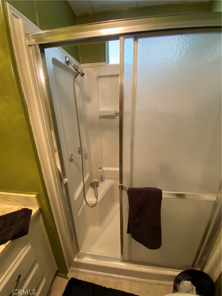 12680 4th Street, Unit 39 Yucaipa, CA 92399 - Photo 25 of 45 a bathroom with a bathtub and shower