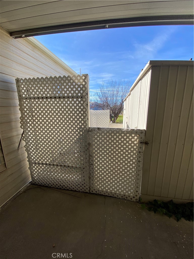12680 4th Street, Unit 39 Yucaipa, CA 92399 - Photo 41 of 45 a view of a black gate