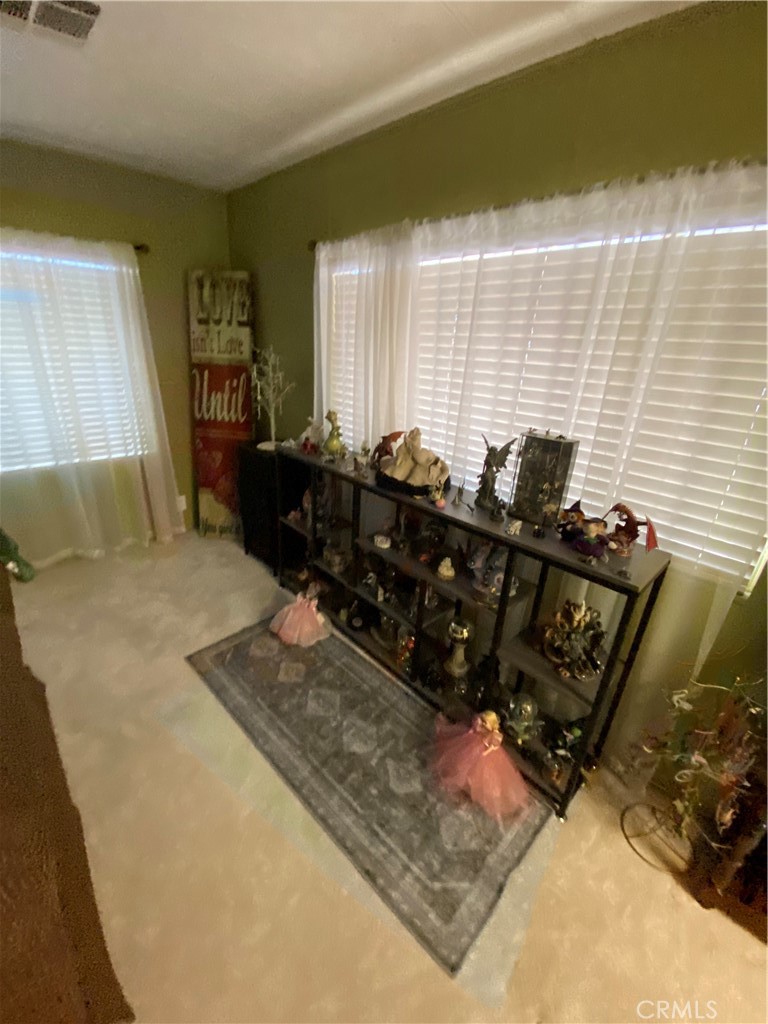 12680 4th Street, Unit 39 Yucaipa, CA 92399 - Photo 10 of 45 a living room with hard wood floors