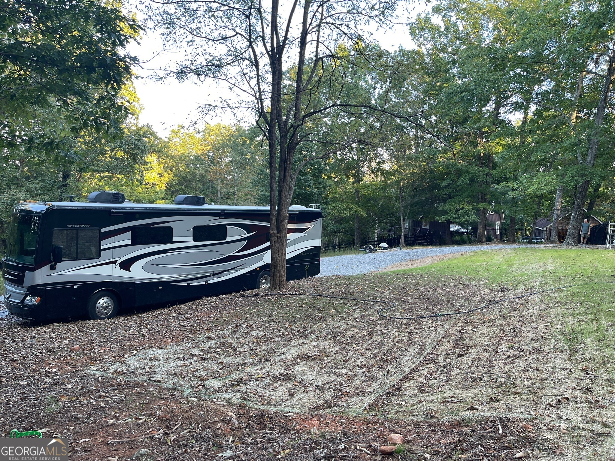 0 Stancil Dyer Road Dahlonega, GA 30533 - Photo 41 of 43 a front view of a house with garden