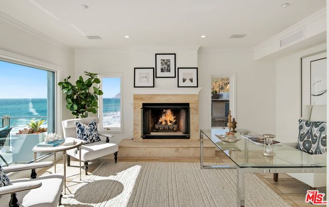 a large bathroom with a double vanity sink mirror and bathtub