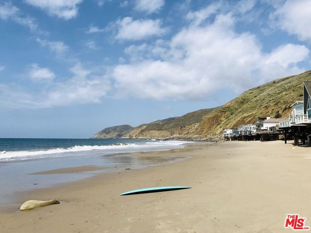 a view of a terrace with furniture