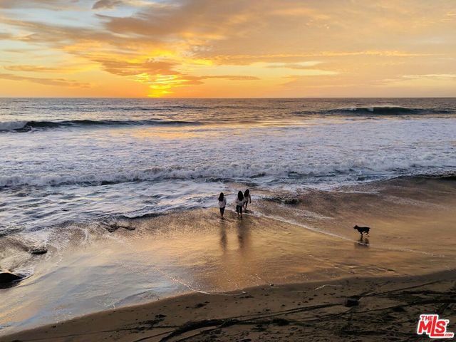 a terrace of a house with outdoor seating