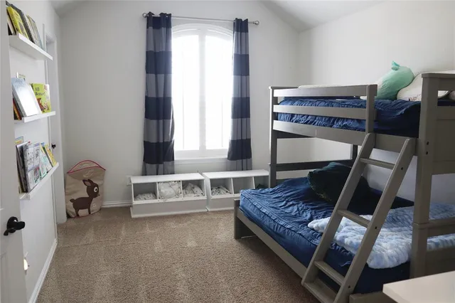 a bathroom with a toilet and a bathtub