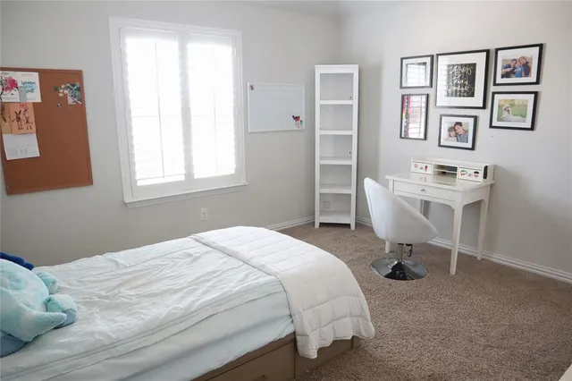 a view of a workspace with furniture