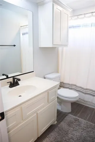 a view of a workspace with furniture and wall painting