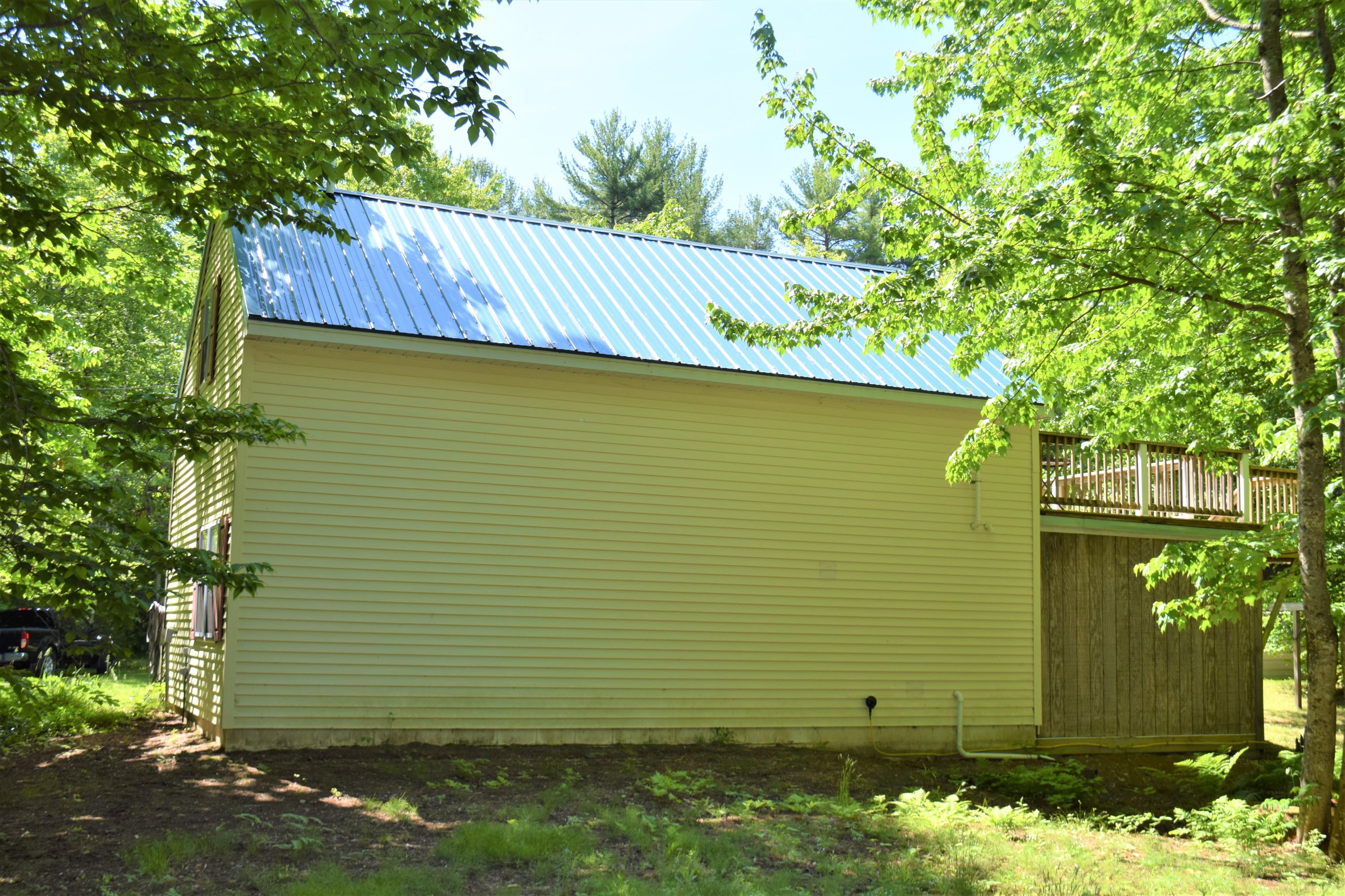 125 Gore Road Naples, ME 04055 - Photo 4 of 33 rear of home