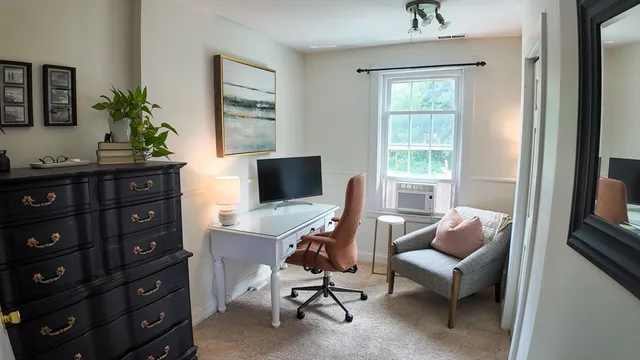 a kitchen with stainless steel appliances granite countertop a refrigerator a sink and a stove