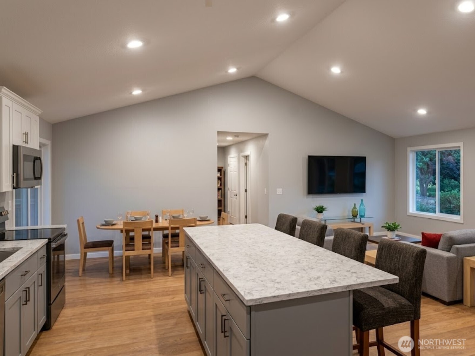 5 Endor Heights Vader, WA 98593 - Photo 6 of 15 a large dining space with furniture a rug and a flat screen tv