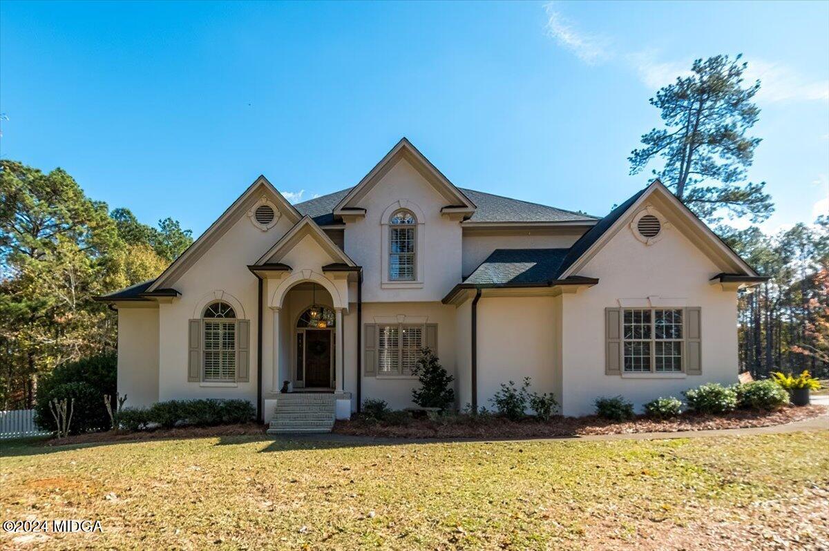 7701 Whittle Road Macon, GA 31220 - Photo 1 of 56 a view of a house with a yard