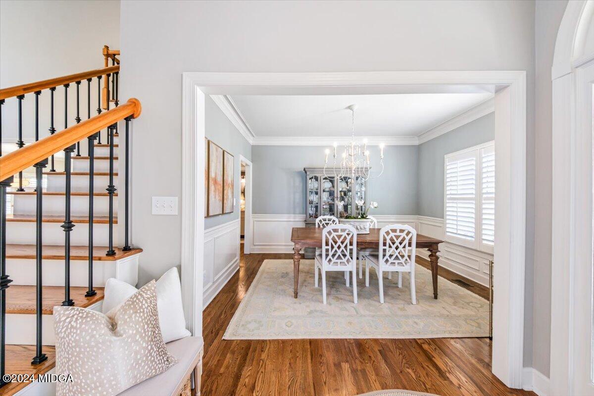 7701 Whittle Road Macon, GA 31220 - Photo 19 of 56 a dining room with furniture and wooden floor