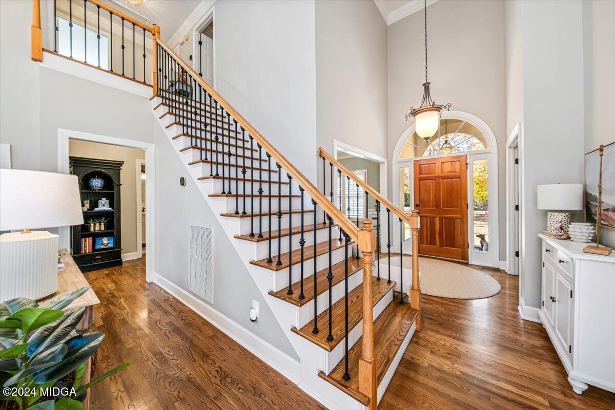 7701 Whittle Road Macon, GA 31220 - Photo 23 of 56 a view of entryway and hall with wooden floor