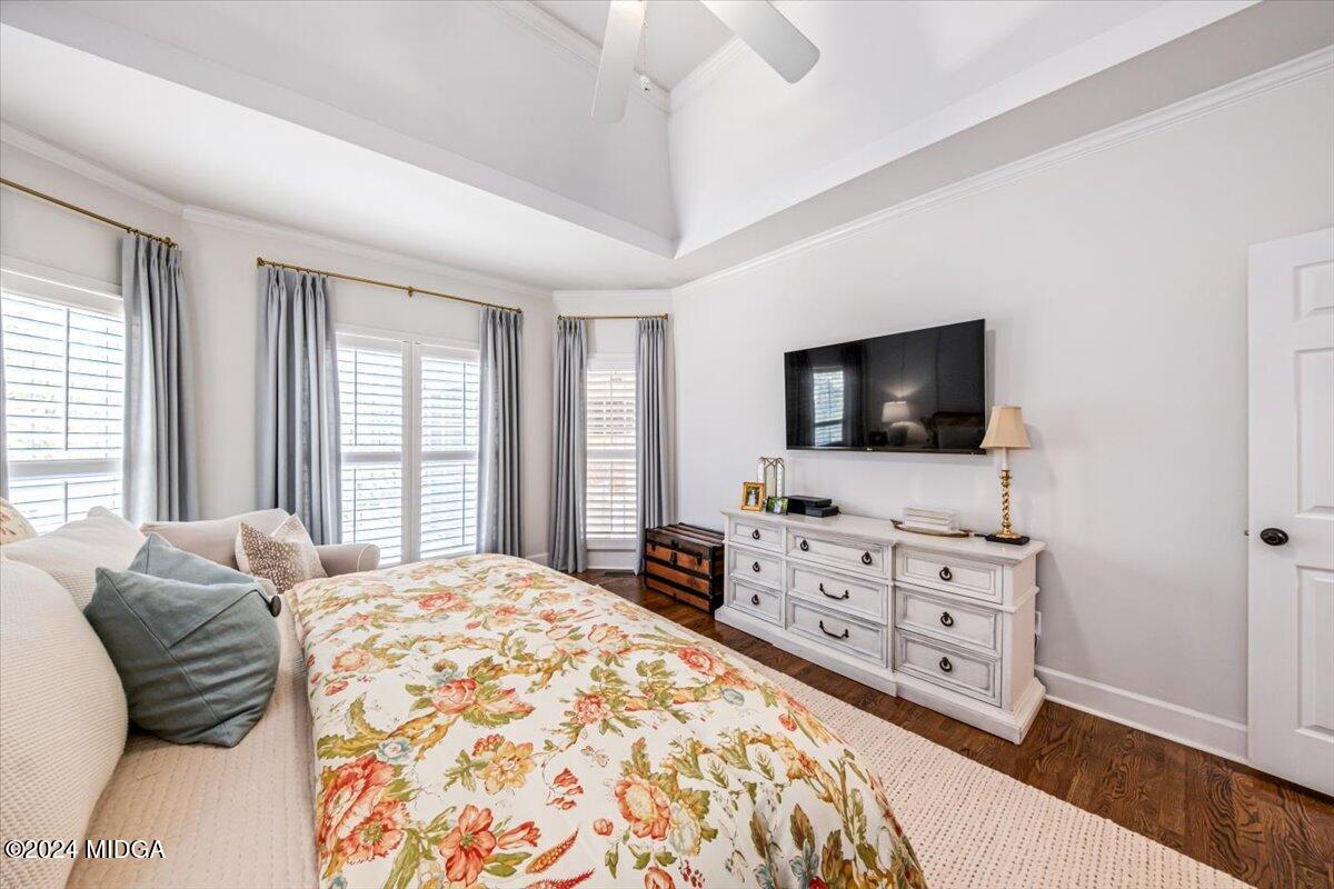 7701 Whittle Road Macon, GA 31220 - Photo 28 of 56 a bedroom with a bed and a flat screen tv