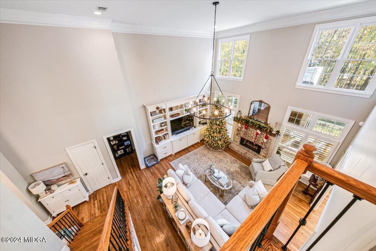 7701 Whittle Road Macon, GA 31220 - Photo 39 of 56 a living room with furniture and a wooden floor