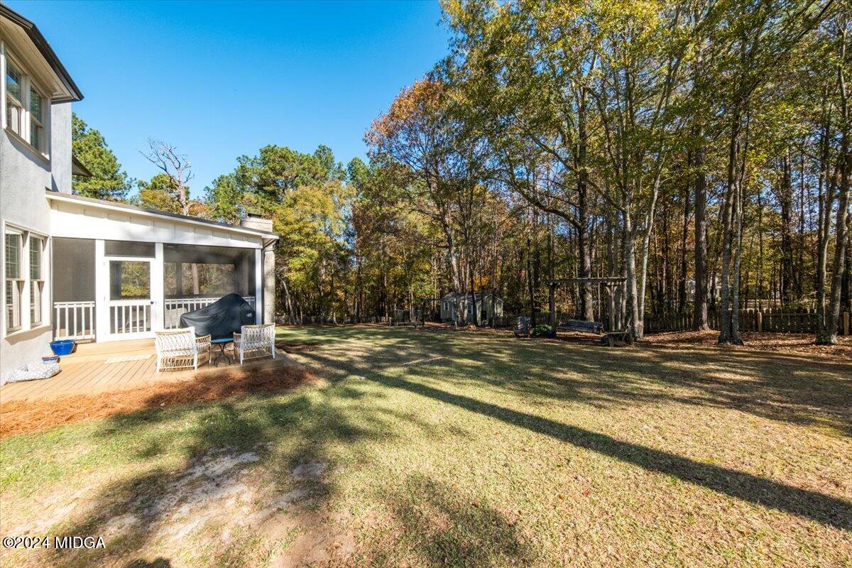 7701 Whittle Road Macon, GA 31220 - Photo 43 of 56 a view of a house with backyard and sitting area