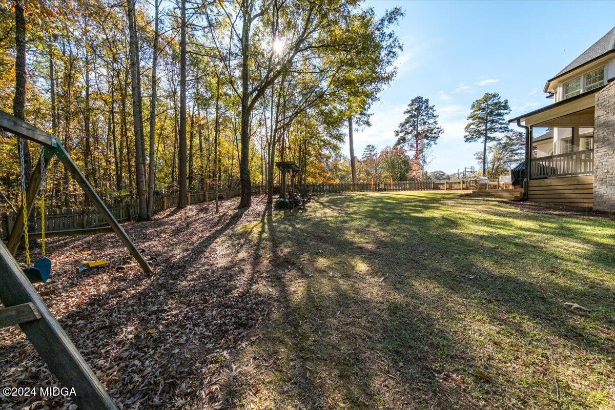 7701 Whittle Road Macon, GA 31220 - Photo 50 of 56 a view of a yard with plants and trees