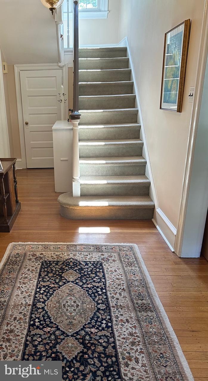 Foyer entry with winding stairway.