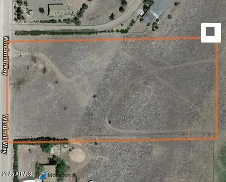 a view of a lake from a yard