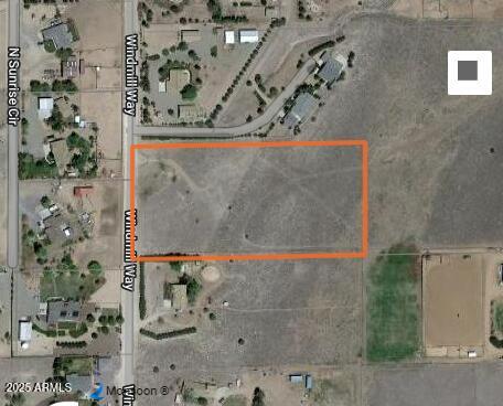 1875 Windmill Way Chino Valley, AZ 86323 - Photo 7 of 9 view of a door with a tree in front of house